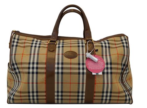 burberry travel colleciton women|Burberry bag accessories.